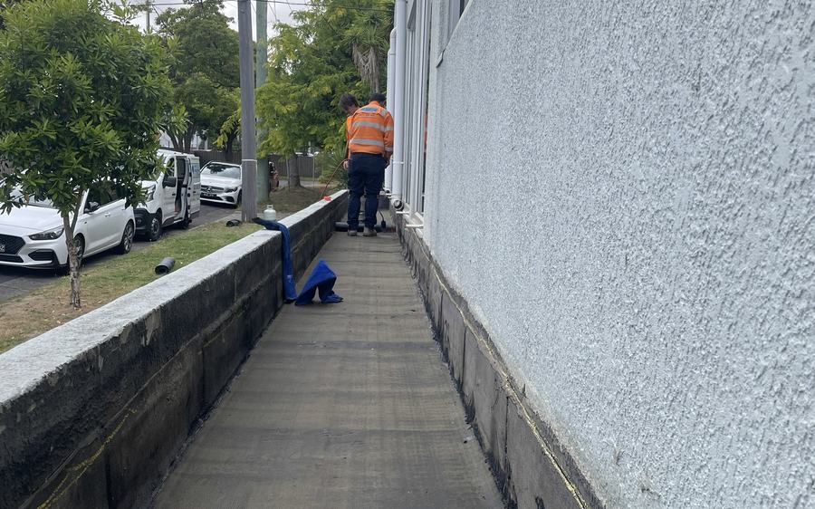 Zichron crew carrying out water damage rectification works along a commercial building façade